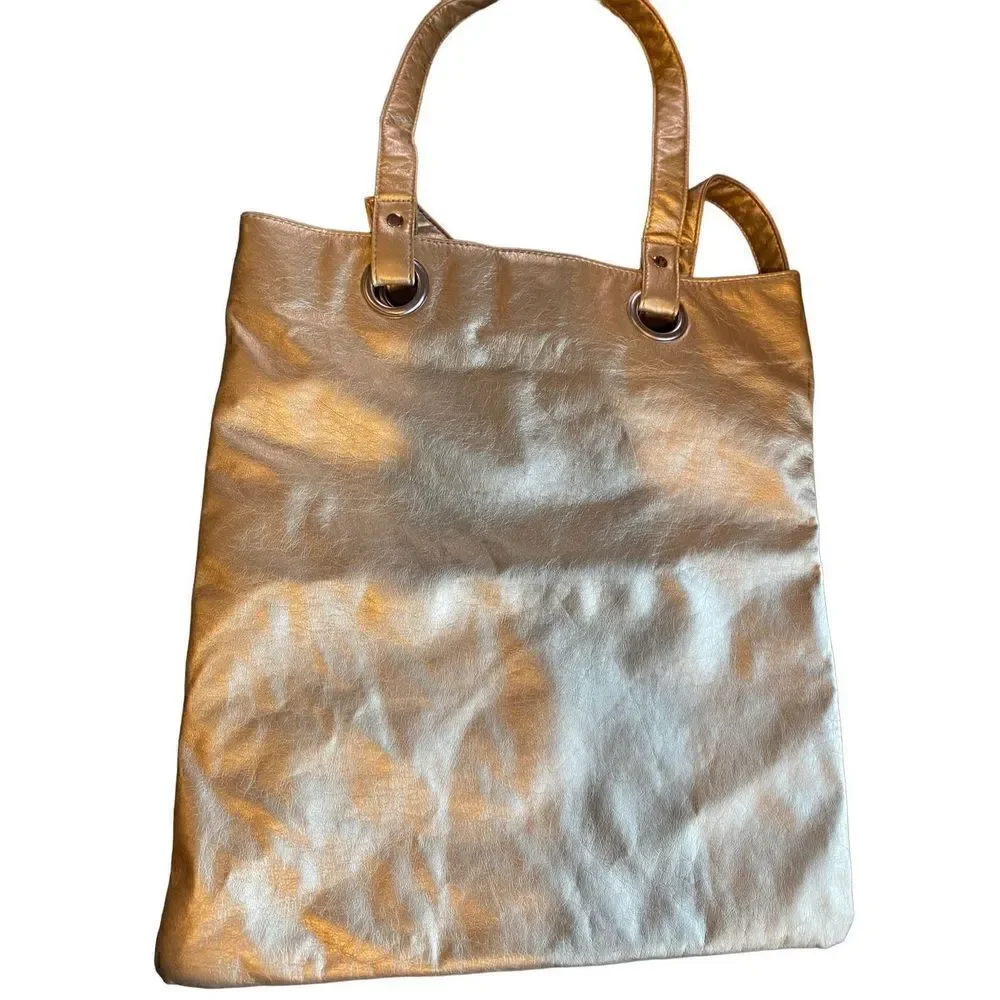 Gold faux leather shoulder bag new with out tags clean